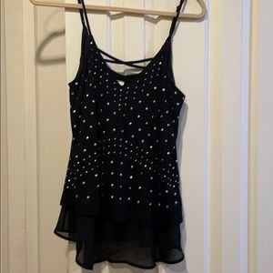 Silver studded flowey tank.